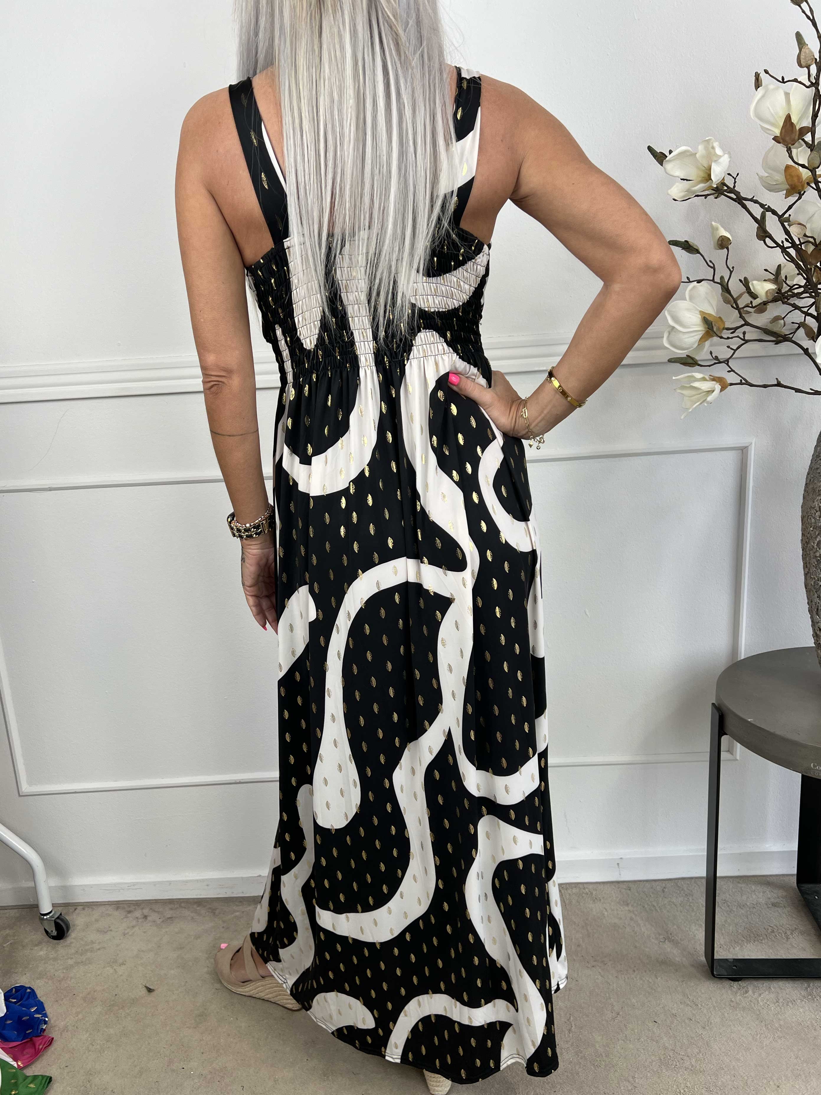 Kenza - Mönstrad klänning med axelband i elastiskt tyg